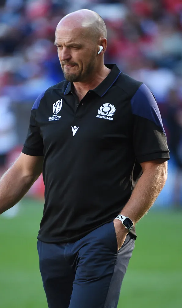 Scotland coach Gregor Townsend wearing a Scotland polo shirt with the crowd in the background