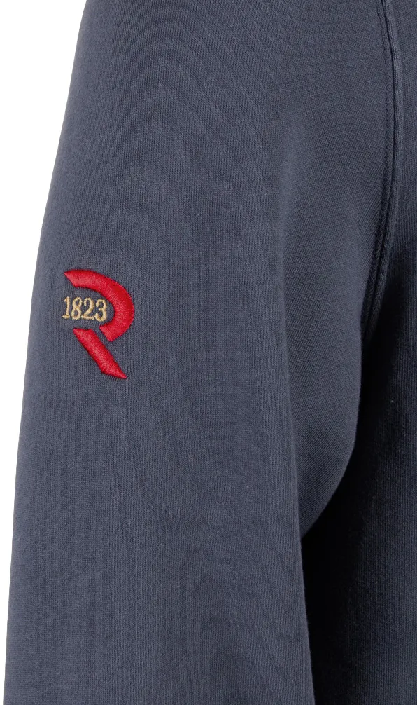 Rugby 1823 logo on the sleeve of a hoodie from the founding days of our sport