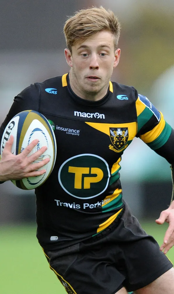 Northampton Saints Rugby Northampton Saints rugby player makes a sudden change of direction during a rugby game