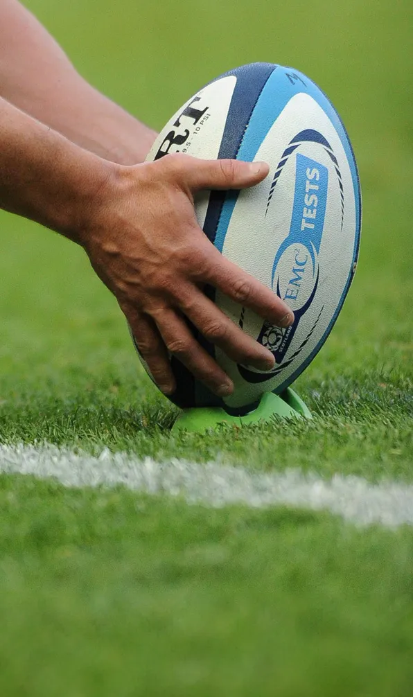 Rugby ball placed on a kicking tee during a Scotland test match