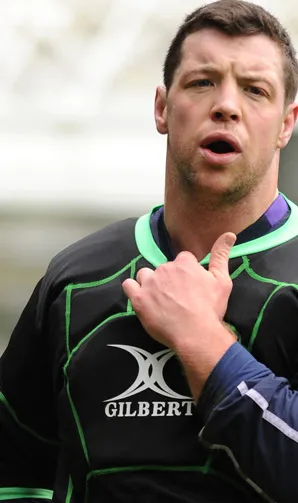 Male rugby player wearing Gilbert rugby body armour during a training session