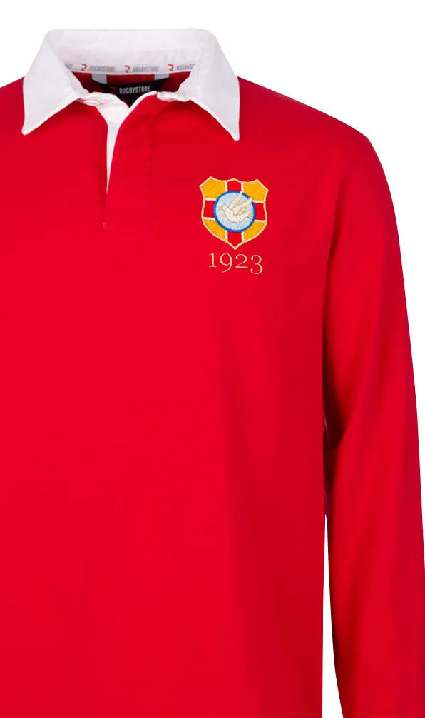 Tonga Rugby Classics A classic red rugby shirt with a white collar featuring the Tongan rugby crest embroidered on the chest