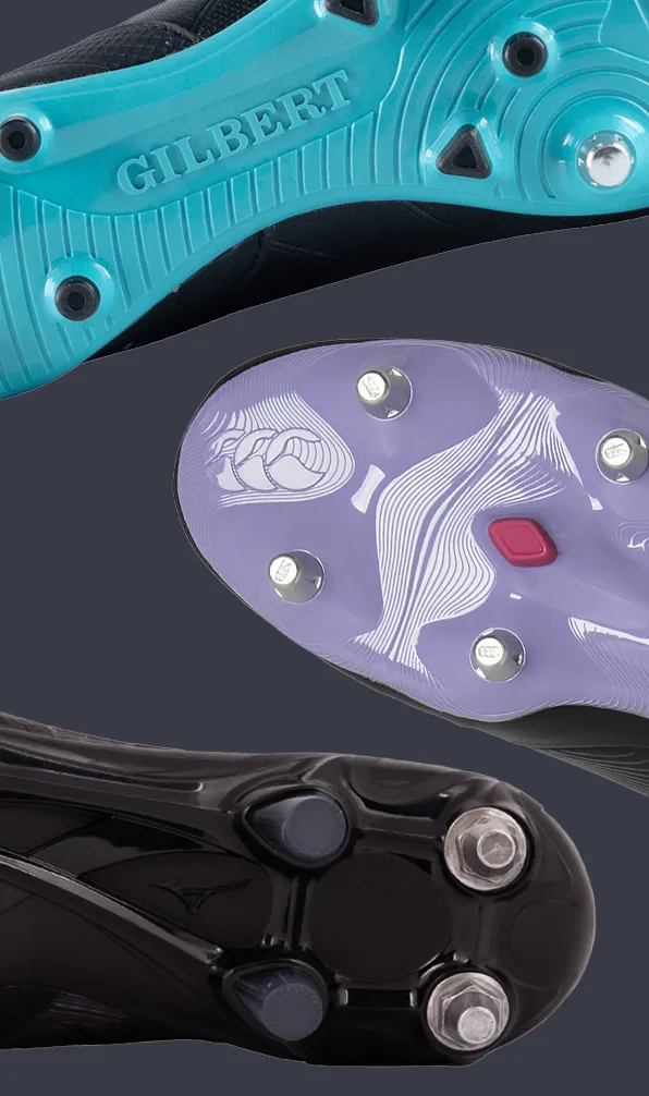 A selection of mens rugby boots played on a grey background